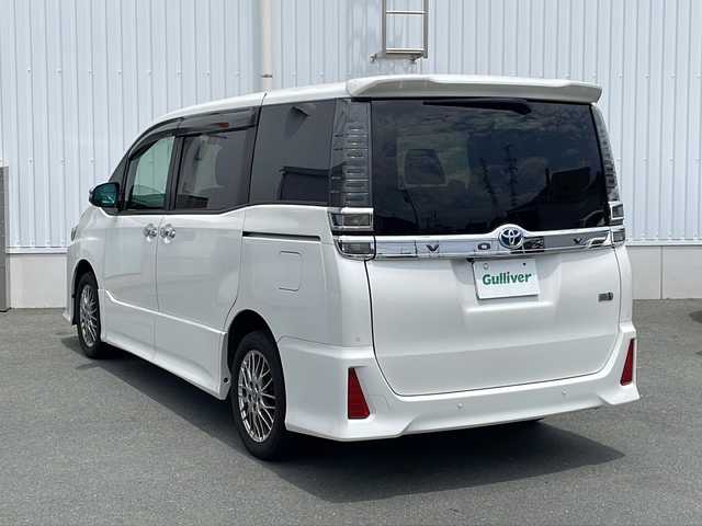 トヨタ ヴォクシー ハイブリッド ZS 煌Ⅱ 三重県 2020(令2)年 4.9万km ホワイトパールクリスタルシャイン 純正９インチナビ　/フルセグＴＶ　/ＣＤ、ＤＶＤ再生　/Ｂｌｕｅｔｏｏｔｈ　/フリップダウンモニター　/衝突軽減ブレーキ　/前席シートヒーター　/クルーズコントロール　/レインクリアリングブルーミラー　/７人乗り