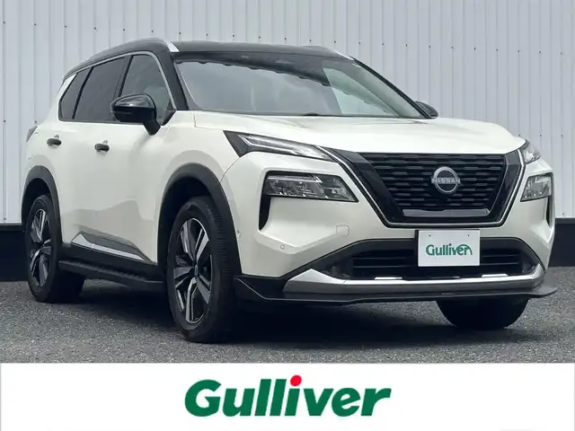 日産 エクストレイル G e－4ORCE 千葉県 2022(令4)年 0.5万km ブリリアントホワイトパール/スーパーブラック 2トーン 日産コネクトナビ/(TV/Bluetooth/AM/FM)/全方位カメラ/プロパイロット/衝突被害軽減システム/車線逸脱警報/クルーズコントロール/電動リアゲート/レザーシート/横滑り防止装置/ETC2.0/ドライブレコーダー/LEDヘッドライト/フォグランプ/オートライト/ウィンカーミラー/電動格納ミラー/純正19インチAW/シートヒーター/シートリフター/ステアリングヒーター/プッシュスタート/スマートキー/フロアマット/スペアキー/取扱説明書/保証書