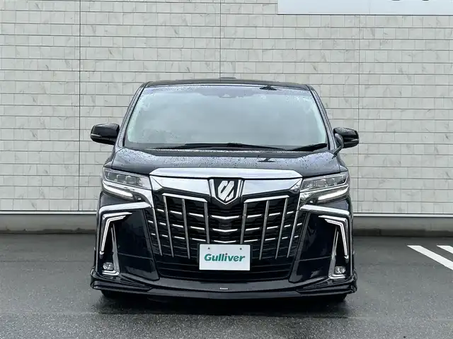 トヨタ アルファード S Cパッケージ 福岡県 2019(令1)年 6万km ブラック 社外１０型SDナビ(フルセグTV/CD/DVD/BT)フリップダウンモニターサンルーフ電動リアゲートトヨタセーフティーモデリスタエアロコーナーセンサー両側パワスラレーダークルコンシートヒーター エアシートハンドルヒーターデジタルミラーオートホールド三眼LEDヘッドライトシーケンスウィンカープッシュスタートスマートキー