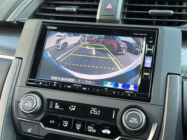 ホンダ シビック ハッチバック 栃木県 2018(平30)年 4.8万km クリスタルブラックパール 禁煙/Honda SENSING/・衝突軽減ブレーキ〈CMBS〉/・渋滞追従機能付アダプティブ・クルーズ・コントロール/・LKAS〈車線維持支援システム〉/・路外逸脱抑制機能/・オートハイビーム/・標識認識機能/アジャイルハンドリングアシスト/純正ナビ（VXM-185VFi）/・フルセグ/CD/DVD/Bluetooth/SD/バックカメラ/革巻きステアリング/ステアリングスイッチ/パドルシフト/オートライト/シートヒーター/電動パーキングブレーキ/ブレーキホールド/スマートキー/プッシュスタート/スペアキー/純正ドライブレコーダー/ETC/ピアノブラック・フロントグリル/フロントスポイラー/純正１８インチアルミホイール/W+サイド+カーテンエアバック