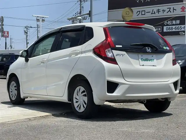 ホンダ フィット 13G Fパッケージ 徳島県 2016(平28)年 1万km プレミアムホワイトパールⅡ 純正ナビ VXM-164VFi/（AM.FM.CD.DVD.BT.フルセグ）/ETC/プッシュスタート/スマートキー/スペアキー1本/純正14インチホイールキャップ/ヘッドライトレベライザー