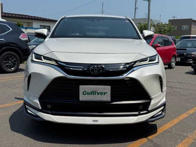 トヨタ ハリアー Z 道東・釧路十勝 2020(令2)年 4.4万km ホワイトパールクリスタルシャイン 4WD/寒冷地仕様/ワンオーナー/純正ディスプレイオーディオ/  (ナビ/フルセグTV/Bluetooth)/パノラミックビューモニター/トヨタセーフティセンス/  プリクラッシュセーフティ/  レーントレーシングアシスト/  レーダークルーズコントロール/  アダプティブハイビームシステム/  ロードサインアシスト/LEDリアフォグランプ/おくだけ充電/フロントワイパーデアイサー/パワバックドア/ハーフレザーシート/パワーシート/デジタルインナーミラー/ブラインドスポットミニター/JBLサウンドシステム/ミラーヒーター/革巻きステアリング/ステアリングリモコン/電動チルト&テレスコピックステアリング/USBソケット/横滑り防止装置/LEDヘッドライト/フォグライト/純正フロアマット/純正ドアバイザー/純正ラゲッジマット/ビルトインETC(2.0)/モデリスタフルエアロ/ヘッドアップディスプレイ/スマートキー/エンジンプッシュスタート/スペアキー/取扱説明書/保証書/純正19インチアルミホイール/冬タイヤ積み込み/  (225/65R17、6mm、2020年製、BS、社外AW)