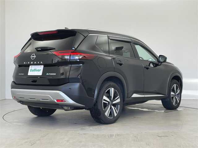 日産 エクストレイル G e－4ORCE 愛知県 2024(令6)年 0.5万km ダイヤモンドブラック ・禁煙車/・純正12.3インチナビ/（フルセグTV/Bluetooth/AppleCarPlay/AndroidAuto）/・アラウンドビューモニター/・ビルトインETC2.0/・純正LED/・オートライト/・プロパイロット/・エマージェンシーブレーキ/・LDW/・BSW/・RCTA/・デジタルインナーミラー/・電動パーキング/・オートホールド/・全席シートヒーター/・パワーシート（D+N）/・シートメモリ/・ステアリングリモコン/・革巻きステアリング/・ステアリングヒーター/・踏み間違い防止/・ふらつき警報/・前後ドライブレコーダー/・パワーバックドア/・AC100V/・スマートキー/・純正19インチアルミホイール/・ワイヤレス充電