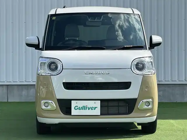 ダイハツ ムーヴ キャンバス ストライプス G 香川県 2023(令5)年 0.1千km シャイニングホワイトパール/サンドベージュメタリック 登録済み未使用車/両側パワースライドドア/シートヒーター/フルファブリックシート/スマートアシストII/→衝突回避支援ブレーキ機能/→LKC（レーンキープコントロール）/→コーナーセンサー（前後）/→車線逸脱警報機能/→ブレーキ制御付き誤発進抑制機能（前後）/→ふらつき警報/→先行車発進おしらせ機能/LEDオートライト/LDEフォグランプ/ステアリングスイッチ/オートホールド機能/電動格納ミラー/ホっとカップホルダー（保温機能・前席）/スマートキー/スペアキー