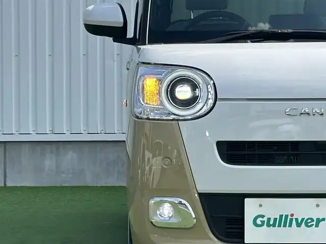 ダイハツ ムーヴ キャンバス ストライプス G 香川県 2023(令5)年 0.1千km シャイニングホワイトパール/サンドベージュメタリック 登録済み未使用車/両側パワースライドドア/シートヒーター/フルファブリックシート/スマートアシストII/→衝突回避支援ブレーキ機能/→LKC（レーンキープコントロール）/→コーナーセンサー（前後）/→車線逸脱警報機能/→ブレーキ制御付き誤発進抑制機能（前後）/→ふらつき警報/→先行車発進おしらせ機能/LEDオートライト/LDEフォグランプ/ステアリングスイッチ/オートホールド機能/電動格納ミラー/ホっとカップホルダー（保温機能・前席）/スマートキー/スペアキー