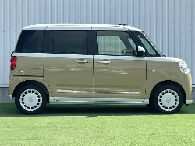 ダイハツ ムーヴ キャンバス ストライプス G 香川県 2023(令5)年 0.1千km シャイニングホワイトパール/サンドベージュメタリック 登録済み未使用車/両側パワースライドドア/シートヒーター/フルファブリックシート/スマートアシストII/→衝突回避支援ブレーキ機能/→LKC（レーンキープコントロール）/→コーナーセンサー（前後）/→車線逸脱警報機能/→ブレーキ制御付き誤発進抑制機能（前後）/→ふらつき警報/→先行車発進おしらせ機能/LEDオートライト/LDEフォグランプ/ステアリングスイッチ/オートホールド機能/電動格納ミラー/ホっとカップホルダー（保温機能・前席）/スマートキー/スペアキー