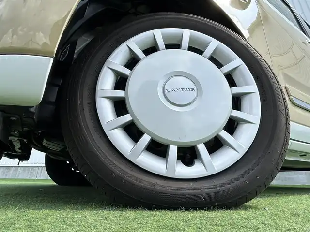 ダイハツ ムーヴ キャンバス ストライプス G 香川県 2023(令5)年 0.1千km シャイニングホワイトパール/サンドベージュメタリック 登録済み未使用車/両側パワースライドドア/シートヒーター/フルファブリックシート/スマートアシストII/→衝突回避支援ブレーキ機能/→LKC（レーンキープコントロール）/→コーナーセンサー（前後）/→車線逸脱警報機能/→ブレーキ制御付き誤発進抑制機能（前後）/→ふらつき警報/→先行車発進おしらせ機能/LEDオートライト/LDEフォグランプ/ステアリングスイッチ/オートホールド機能/電動格納ミラー/ホっとカップホルダー（保温機能・前席）/スマートキー/スペアキー