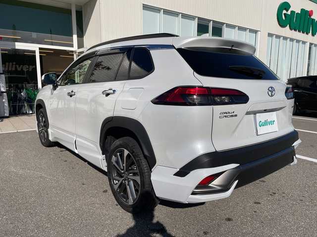 トヨタ カローラ クロス ハイブリッド Z 石川県 2024(令6)年 1.5万km パール モデリスタエアロ　純正１０．５型ナビ　フルセグＴＶ　パノラマモニター　ＬＥＤヘッドライト　ハーフレザーシート　シートヒーター　ＢＳＭ　純正アルミホイール　トヨタセーフティセンス　レーダークルーズ　ETC　スマートキー　プッシュスタート　電動ミラー　保証書