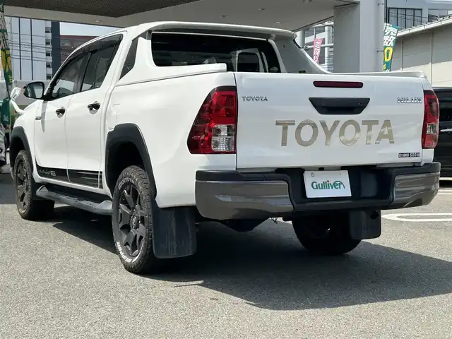 トヨタ ハイラックス Z ブラックラリーエディション 福岡県 2019(令1)年 12.1万km スーパーホワイトⅡ ワンオーナー/禁煙車/社外ナビ/（BT・CD・DVD・TV)/TRD仕様/クルーズコントロール/本革ステアリング/ステアリングリモコン/前後ドライブレコーダー/PWR　HEAT/ETC/プッシュスタート/ダウンヒルアシストコントロール/センターデフロック/バックカメラ/純正フロアマット/純正アルミホイール/MTモード付きAT/ドアバイザー/スペアスマートキー×１/保証書/取扱説明書