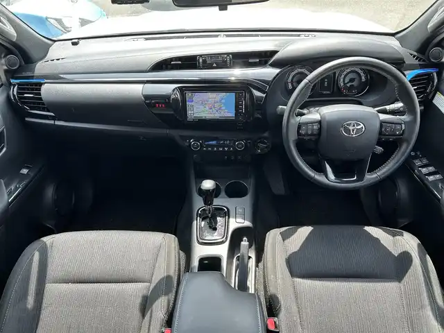トヨタ ハイラックス Z ブラックラリーエディション 福岡県 2019(令1)年 12.1万km スーパーホワイトⅡ ワンオーナー/禁煙車/社外ナビ/（BT・CD・DVD・TV)/TRD仕様/クルーズコントロール/本革ステアリング/ステアリングリモコン/前後ドライブレコーダー/PWR　HEAT/ETC/プッシュスタート/ダウンヒルアシストコントロール/センターデフロック/バックカメラ/純正フロアマット/純正アルミホイール/MTモード付きAT/ドアバイザー/スペアスマートキー×１/保証書/取扱説明書