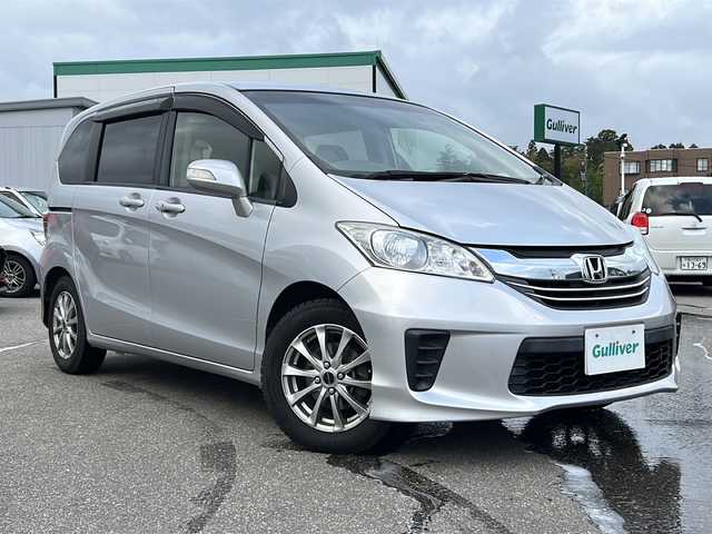 ホンダ フリード G ジャストセレクション 石川県 2015(平27)年 4.6万km シルバー 純正ナビ　/（フルセグ／ＢＴ／ＣＤ／ＤＶＤ）　/バックモニター　/両側パワースライドドア　/オートライト　/電動格納ミラー　/ドライブレコーダー　/ETC　/社外AW　/ステアリングスイッチ
