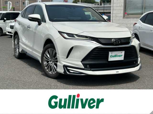 トヨタ ハリアー Z 広島県 2020(令2)年 2.9万km ホワイトパールクリスタルシャイン MODELISTAエアロ/[デイライト付き]/JBLプレミアムサウンド/フルセグTV/アイドリングストップ/レーダクルーズコントロール/ブラインドスポットモニター/リアクロストラフィックアラート/電動パーキングシステム/電動リアゲート/ブレーキホールド/全方位カメラ/ETC2.0[ビルトイン]/パワーシート[D席]/LED[ヘッド/フォグ]/オートマチックハイビーム/デジタルインナーミラー/クリアランスソナー/プッシュスタート/[Bluetooth/AM/FM]/純正フロアマット/純正アルミ/スペアキー/[1本]/保証書/取扱説明書