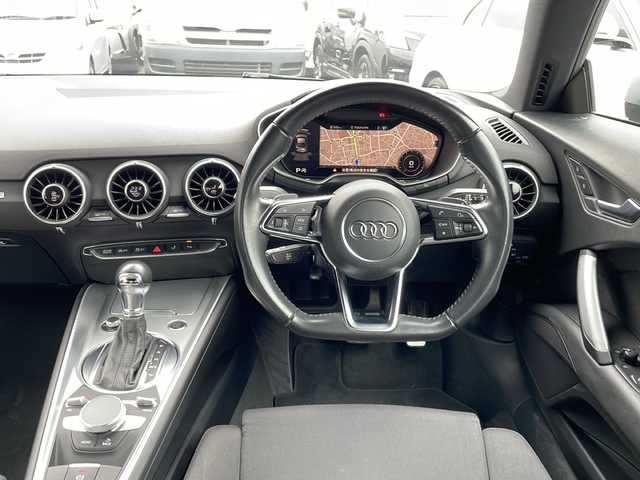 アウディ ＴＴクーペ 1．8TFSI 1st E 東京都 2016(平28)年 5.7万km ミトスブラックメタリック 新車時保証書 整備記録簿/取扱説明書 /アシスタンスP/クルーズコントロール/純正ナビ/フルセグTV/SD/CD/DVD/BT/USB/AUX/バックカメラ ETC【DSRC】/Fドライブレコーダー/LEDライト/オートライト/スマートキー×2/パドルシフト付革巻きハンドル/コーナーセンサー/純正18インチアルミ
