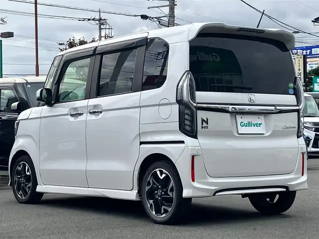 ホンダ Ｎ ＢＯＸ カスタム G L ターボ ホンダセンシング 静岡県 2020(令2)年 4.8万km プラチナホワイトパール SDナビ（CD/DVD/BT/フルセグ）/KENWOOD製MDV-M906HDL/バックカメラ/ホンダセンシング/ドライブレコーダー/D席N席シートヒーター/両側パワースライドドア/コーナーセンサー/レーンキープアシスト/オートライト/オートマチックハイビーム/LEDヘッドライト/W+サイドエアバッグ/カーテンエアバッグ/衝突軽減システム/エンジンスタートボタン/パワーステアリング/パワーウィンドウ/アイドリングストップ/オートエアコン/プラズマクラスター技術搭載フルオート/エアコンディショナー/USB入力端子/フロアマット/ハーフレザーシート/ベンチシート/オートリトラミラー/レルクリーンプラスシート