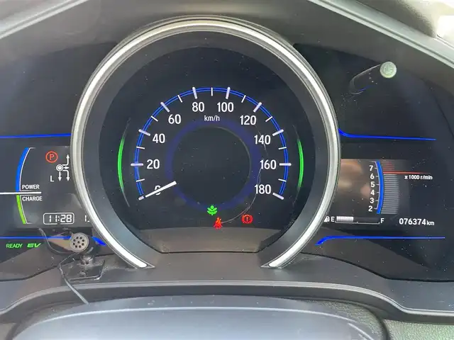 ホンダ フィット ハイブリット Lパッケージ 福岡県 2015(平27)年 7.7万km 白 SDナビ(BT、ワンセグTV、バックカメラ)/ビルトインETC/ハーフレザーシート/純正フロアマット/オートライト/衝突被害軽減システム/スマートキー