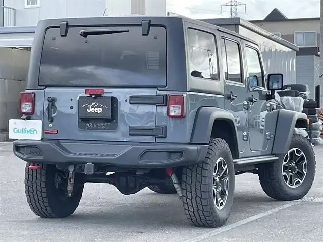 クライスラー・ジープ ジープ ラングラー アンリミテッド ルビコン10th 道央・札幌 2013(平25)年 10.3万km アンヴィル ４WD/社外メモリーナビ/CD/DVD/BT/フルセグ/横滑り防止装置/クルーズコントロール/ダウンヒルアシストコントロール/バック/サイド/フロントカメラ/ETC/ドライブレコーダー/自動防眩ミラー/AXLELOCK/SWAYBAR/前席シートヒーター/レザーシート/革巻きステアリング/ステアリングリモコン/ハンドルカバー/MTモード付AT/リモコンキー/ハロゲンヘッドライト/オートライト/フォグランプ/ヒーテッドドアミラー/純正ラバーフロアマット/純正AW付夏タイヤ積込（1本）/285/70/R17/2011年/山10mm