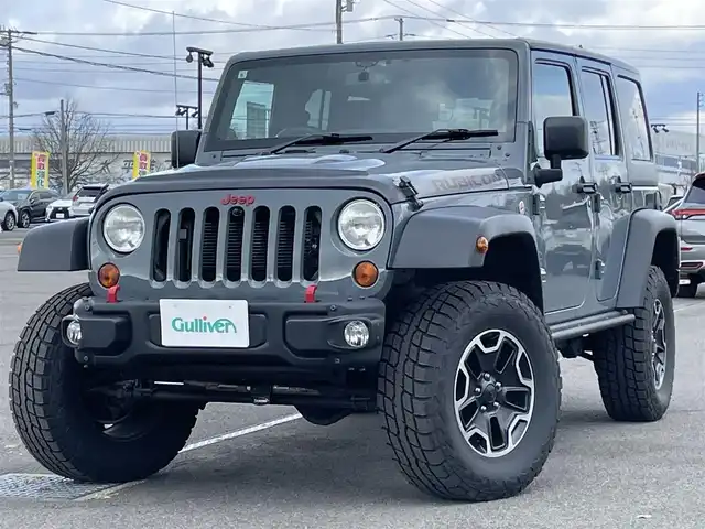 クライスラー・ジープ ジープ ラングラー アンリミテッド ルビコン10th 道央・札幌 2013(平25)年 10.3万km アンヴィル ４WD/社外メモリーナビ/CD/DVD/BT/フルセグ/横滑り防止装置/クルーズコントロール/ダウンヒルアシストコントロール/バック/サイド/フロントカメラ/ETC/ドライブレコーダー/自動防眩ミラー/AXLELOCK/SWAYBAR/前席シートヒーター/レザーシート/革巻きステアリング/ステアリングリモコン/ハンドルカバー/MTモード付AT/リモコンキー/ハロゲンヘッドライト/オートライト/フォグランプ/ヒーテッドドアミラー/純正ラバーフロアマット/純正AW付夏タイヤ積込（1本）/285/70/R17/2011年/山10mm