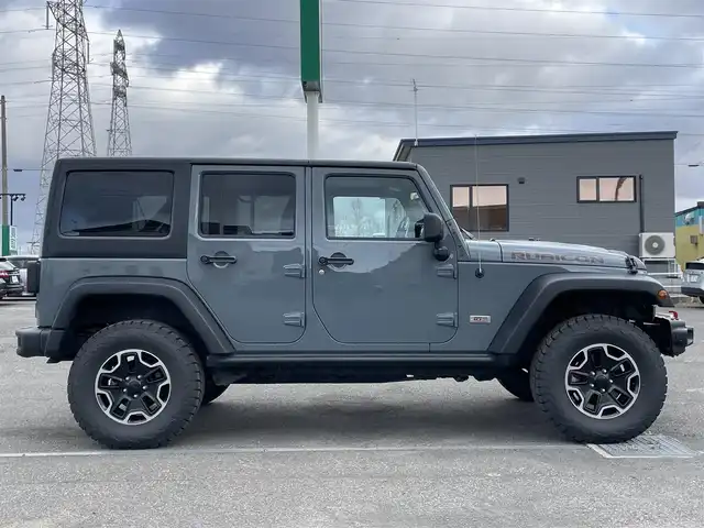 クライスラー・ジープ ジープ ラングラー アンリミテッド ルビコン10th 道央・札幌 2013(平25)年 10.3万km アンヴィル ４WD/社外メモリーナビ/CD/DVD/BT/フルセグ/横滑り防止装置/クルーズコントロール/ダウンヒルアシストコントロール/バック/サイド/フロントカメラ/ETC/ドライブレコーダー/自動防眩ミラー/AXLELOCK/SWAYBAR/前席シートヒーター/レザーシート/革巻きステアリング/ステアリングリモコン/ハンドルカバー/MTモード付AT/リモコンキー/ハロゲンヘッドライト/オートライト/フォグランプ/ヒーテッドドアミラー/純正ラバーフロアマット/純正AW付夏タイヤ積込（1本）/285/70/R17/2011年/山10mm