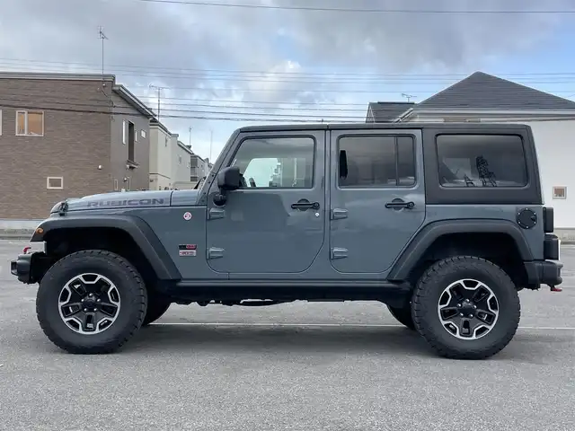 クライスラー・ジープ ジープ ラングラー アンリミテッド ルビコン10th 道央・札幌 2013(平25)年 10.3万km アンヴィル ４WD/社外メモリーナビ/CD/DVD/BT/フルセグ/横滑り防止装置/クルーズコントロール/ダウンヒルアシストコントロール/バック/サイド/フロントカメラ/ETC/ドライブレコーダー/自動防眩ミラー/AXLELOCK/SWAYBAR/前席シートヒーター/レザーシート/革巻きステアリング/ステアリングリモコン/ハンドルカバー/MTモード付AT/リモコンキー/ハロゲンヘッドライト/オートライト/フォグランプ/ヒーテッドドアミラー/純正ラバーフロアマット/純正AW付夏タイヤ積込（1本）/285/70/R17/2011年/山10mm