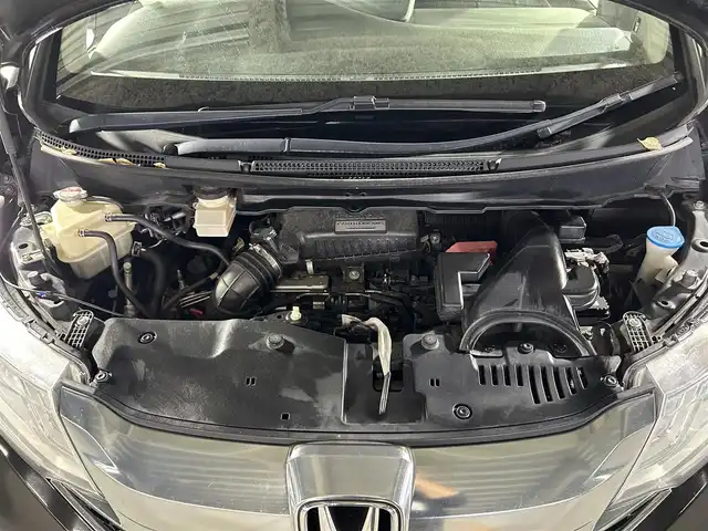 ホンダ ステップワゴン スパーダ 佐賀県 2015(平27)年 10.8万km プレミアムスパークルブラックパール 純正9インチナビ/Bluetooth/フルセグ/AM/FMCD/DVD/バックカメラ/ホンダセンシング/衝突軽減ブレーキ/オートクルーズコントロール/車線逸脱警報/レーンキープアシスト/誤発進抑制機能/先行車発進通知/標識認識機能/フリップダウンモニター/LEDヘッドライト/オートライト/片側パワースライドドア/ステアリングリモコン