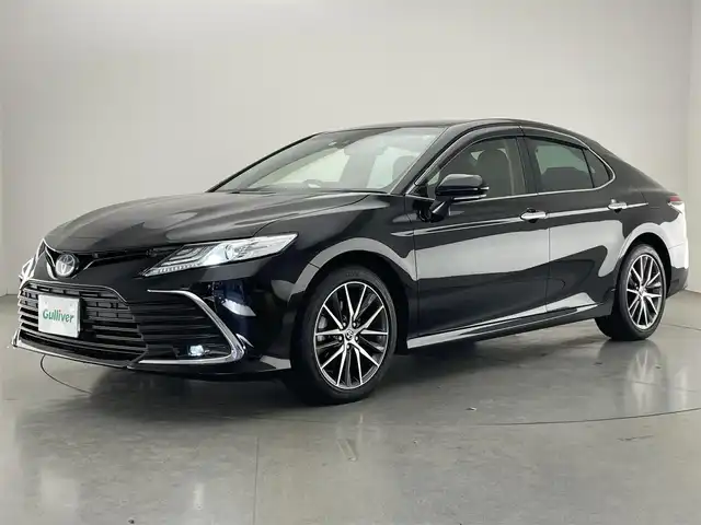 トヨタ カムリ G レザーパッケージ 愛知県 2022(令4)年 3.3万km アティチュードブラックマイカ 純正９型ＤＡナビ　黒革　シートヒーター　禁煙車　ＤＶＤデッキ　ＢＳＭ　ＨＵＤ　バックカメラ　追従クルコン　前後ドラレコ　ＥＴＣ　セーフティセンス　衝突軽減　パワーシート　ＬＥＤライト　コーナーセンサー