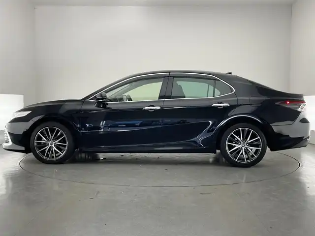 トヨタ カムリ G レザーパッケージ 愛知県 2022(令4)年 3.3万km アティチュードブラックマイカ 純正９型ＤＡナビ　黒革　シートヒーター　禁煙車　ＤＶＤデッキ　ＢＳＭ　ＨＵＤ　バックカメラ　追従クルコン　前後ドラレコ　ＥＴＣ　セーフティセンス　衝突軽減　パワーシート　ＬＥＤライト　コーナーセンサー