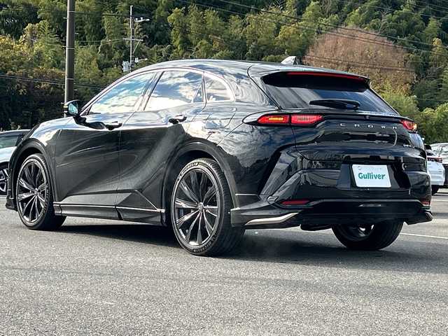 トヨタ クラウン スポーツ Z 佐賀県 2024(令6)年 0.7万km ブラック 4WD/ワンオーナー/パノラマルーフ/モデリスタエアロ(F/S/R)/黒レザーシート/純正12.3インチナビ/(フルセグ/Bluetooth/AppleCarPlay/AM/FM)/全方位カメラ/デジタルインナーミラー/ビルトインETC2.0/前後ドライブレコーダー/レーダークルーズコントロール/クリアランスソナー/プリクラッシュセーフティ/横滑り防止装置/レーンディパーチャーアラート/D/N席シートヒーター・エアーシート/D席メモリーシート/ステアリングヒーター/オートマチックハイビーム/パワーバックドア/純正21インチAW/純正フロアマット/スペアキー