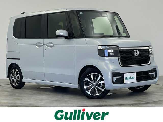 ホンダ Ｎ ＢＯＸ カスタム 群馬県 2024(令6)年 0.6万km プレミアムサンライトホワイトパール 衝突軽減　純正９インチナビ　両側パワースライドドア　　バックカメラ　ＬＥＤオートライト　アダプティブクルーズコントロール　純正１４インチアルミホイール　前後コーナーセンサー　前席シートヒーター　禁煙車