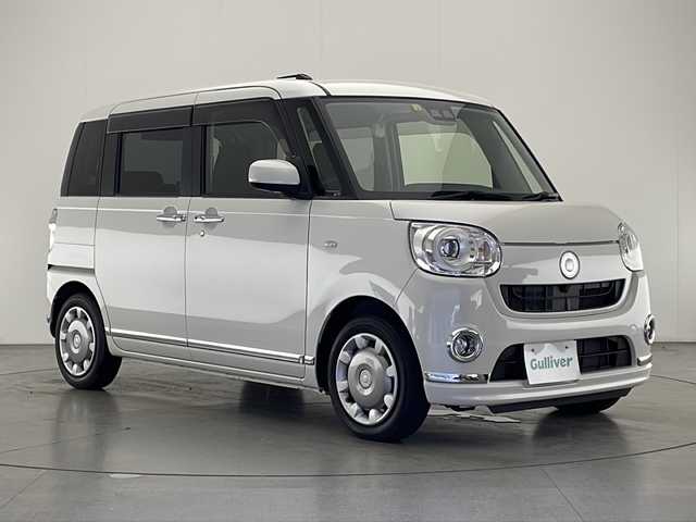 ダイハツ ムーヴ キャンバス G ブラックインテリア リミテッド SAⅢ 宮崎県 2020(令2)年 2.7万km パールホワイトⅢ 禁煙車/衝突被害軽減ブレーキ/純正ディスプレイオーディオ/（DUK-W69D/CD/DVD/Bluetooth/FMAM）/純正セキュリティアラーム/純正LEDオートライト/純正LEDフォグ/純正フロアマット/ブラックインテリア/両側電動スライドドア/パノラミックビューモニター/オートマチックハイビーム/クリアランスソナー/オート電動格納ミラー/オートエアコン/本革巻ハンドル/スマートキー/プッシュエンジンスタート/スペアキー/新車時保証書/取扱い説明書