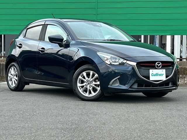 マツダ デミオ XD 茨城県 2015(平27)年 7万km ディープクリスタルブルーマイカ 純正SDナビ/Bluetooth/フルセグTV/バックカメラ/アイドリングストップ/クルーズコントロール/ETC/USB入力端子/横滑り防止装置/衝突軽減システム/オートライト/LEDヘッドライト/コーナーセンサー/純正15インチアルミホイール/純正フロアマット/スマートキー