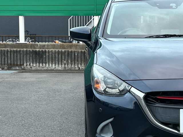 マツダ デミオ XD 茨城県 2015(平27)年 7万km ディープクリスタルブルーマイカ 純正SDナビ/Bluetooth/フルセグTV/バックカメラ/アイドリングストップ/クルーズコントロール/ETC/USB入力端子/横滑り防止装置/衝突軽減システム/オートライト/LEDヘッドライト/コーナーセンサー/純正15インチアルミホイール/純正フロアマット/スマートキー