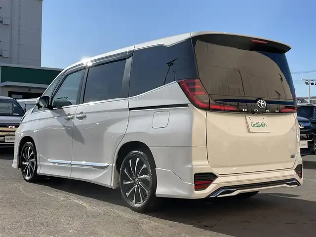 トヨタ ノア ハイブリッド S－Z 東京都 2024(令6)年 2.2万km ホワイトパールクリスタルシャイン 純正ナビ　/Ｂｌｕｅｔｏｏｔｈ　/ＣＤ　/ＤＶＤ　/フルセグＴＶ　/ＵＳＢ　/バックカメラ　/モデリスタフルエアロ　/フリップダウンモニター　/追従型クルーズコントロールシステム　/ＥＴＣ２．０　　/純正アルミホイール/ABS/横滑り防止装置/コーナーセンサー/レーンアシスト/とう純正ナビ　/Ｂｌｕｅｔｏｏｔｈ　/ＣＤ　/ＤＶＤ　/フルセグＴＶ　/ＵＳＢ　/バックカメラ　/モデリスタフルエアロ　/フリップダウンモニター　/追従型クルーズコントロールシステム　/ＥＴＣ２．０　　/純正アルミホイール/ABS/横滑り防止装置/コーナーセンサー/レーンアシスト