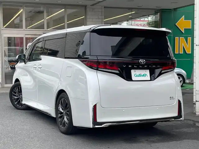 トヨタ ヴェルファイア ハイブリット Z プレミア 東京都 2023(令5)年 1.1万km プラチナホワイトパールマイカ トヨタセーフティーセンス/ワンオーナー/純正SDナビ/・フルセグTV/・FM・AM/・Bluetooth接続/本革レザーシート（茶）/・パワーシート/・後席エグゼクティブパワーシート/・シートヒーター/・エアーシート/両サイドムーンルーフ/後席フリップダウンモニター/バックカメラ/全周囲カメラ/両側パワースライドドア/パワーバックドア/デジタルインナーミラー/レーダークルーズコントロール/ヘッドアップディスプレイ/USB・Cタイプ入力端子/ドラレコ/ETC/WAC/19インチ純正AW/おくだけ充電/スマートキー/スペアキー/ABS/横滑り防止/取扱説明書＆保証書