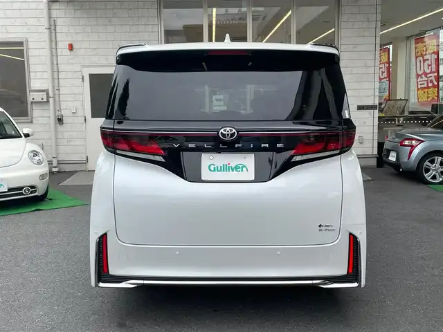 トヨタ ヴェルファイア ハイブリット Z プレミア 東京都 2023(令5)年 1.1万km プラチナホワイトパールマイカ トヨタセーフティーセンス/ワンオーナー/純正SDナビ/・フルセグTV/・FM・AM/・Bluetooth接続/本革レザーシート（茶）/・パワーシート/・後席エグゼクティブパワーシート/・シートヒーター/・エアーシート/両サイドムーンルーフ/後席フリップダウンモニター/バックカメラ/全周囲カメラ/両側パワースライドドア/パワーバックドア/デジタルインナーミラー/レーダークルーズコントロール/ヘッドアップディスプレイ/USB・Cタイプ入力端子/ドラレコ/ETC/WAC/19インチ純正AW/おくだけ充電/スマートキー/スペアキー/ABS/横滑り防止/取扱説明書＆保証書