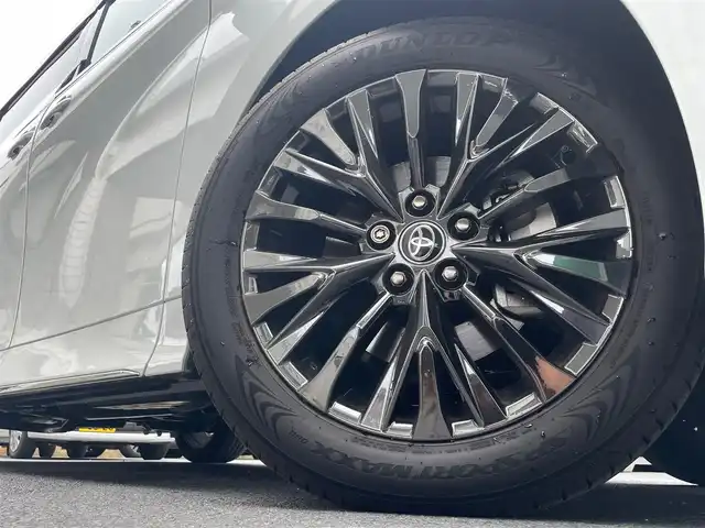 トヨタ ヴェルファイア ハイブリット Z プレミア 東京都 2023(令5)年 1.1万km プラチナホワイトパールマイカ トヨタセーフティーセンス/ワンオーナー/純正SDナビ/・フルセグTV/・FM・AM/・Bluetooth接続/本革レザーシート（茶）/・パワーシート/・後席エグゼクティブパワーシート/・シートヒーター/・エアーシート/両サイドムーンルーフ/後席フリップダウンモニター/バックカメラ/全周囲カメラ/両側パワースライドドア/パワーバックドア/デジタルインナーミラー/レーダークルーズコントロール/ヘッドアップディスプレイ/USB・Cタイプ入力端子/ドラレコ/ETC/WAC/19インチ純正AW/おくだけ充電/スマートキー/スペアキー/ABS/横滑り防止/取扱説明書＆保証書