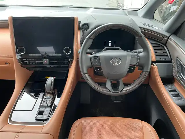 トヨタ ヴェルファイア ハイブリット Z プレミア 東京都 2023(令5)年 1.1万km プラチナホワイトパールマイカ トヨタセーフティーセンス/ワンオーナー/純正SDナビ/・フルセグTV/・FM・AM/・Bluetooth接続/本革レザーシート（茶）/・パワーシート/・後席エグゼクティブパワーシート/・シートヒーター/・エアーシート/両サイドムーンルーフ/後席フリップダウンモニター/バックカメラ/全周囲カメラ/両側パワースライドドア/パワーバックドア/デジタルインナーミラー/レーダークルーズコントロール/ヘッドアップディスプレイ/USB・Cタイプ入力端子/ドラレコ/ETC/WAC/19インチ純正AW/おくだけ充電/スマートキー/スペアキー/ABS/横滑り防止/取扱説明書＆保証書