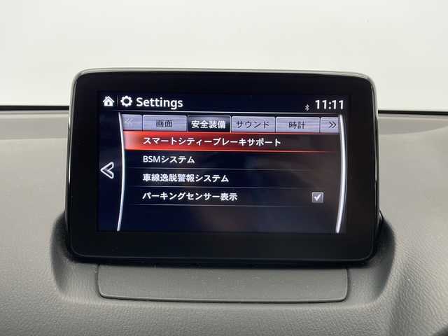 マツダ デミオ 15S 長野県 2018(平30)年 4.6万km スノーフレイクホワイトパールマイカ 純正ナビ（フルセグ/DVD/CD/BT）/スマートシティブレーキサポート/ブラインドスポットモニタリング (BSM)/レーンキープアシスト (LAS)/バックソナー/スペアーキー/ハロゲンヘッドライト/オートライト/アイドリングストップ/電動格納ドアミラー/プッシュスタート/フロアマット/ドアバイザー/冬タイヤ積込み/車両取扱説明書