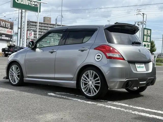スズキ スイフト スポーツ 徳島県 2014(平26)年 5.1万km プレミアムシルバーメタリック ナビ（CN-R3012）/エアロ（フロント）/クルーズコントロール/ETC/フルセグTV/社外フロアマット/プッシュスタート/スマートキー/パドルシフト/ドアバイザー/USB入力端子
