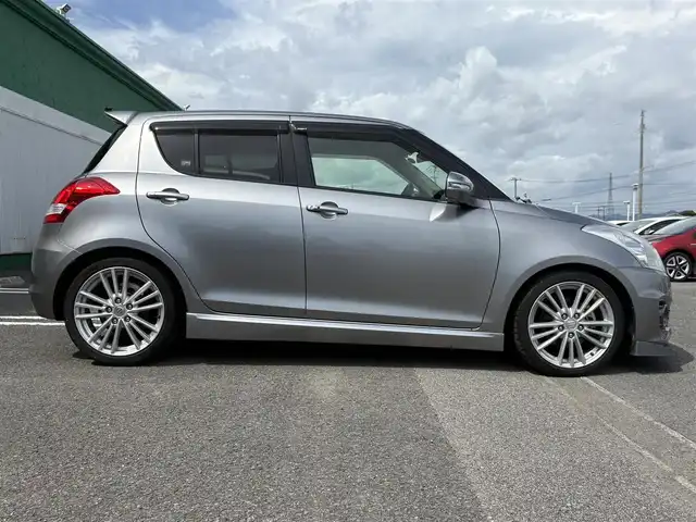 スズキ スイフト スポーツ 徳島県 2014(平26)年 5.1万km プレミアムシルバーメタリック ナビ（CN-R3012）/エアロ（フロント）/クルーズコントロール/ETC/フルセグTV/社外フロアマット/プッシュスタート/スマートキー/パドルシフト/ドアバイザー/USB入力端子