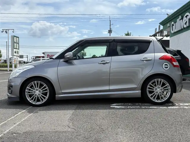 スズキ スイフト スポーツ 徳島県 2014(平26)年 5.1万km プレミアムシルバーメタリック ナビ（CN-R3012）/エアロ（フロント）/クルーズコントロール/ETC/フルセグTV/社外フロアマット/プッシュスタート/スマートキー/パドルシフト/ドアバイザー/USB入力端子