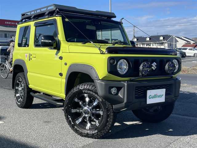 スズキ ジムニー XC 千葉県 2018(平30)年 6万km キネティックイエロー/ブラック スズキセーフティサポート/〇ブレーキサポート/〇誤発信抑制機能/〇車線逸脱防止機能/クルーズコントロール/社外8インチナビ（ケンウッド）/・AM/FM/BTオーディオ/フルセグTV/YOKOHAMA　GEOLANDAR X-AT16インチタイヤ/社外マフラー/IPFオフロードランプ/ルーフキャリア/リアラダー/アルミペダル/ヒルホールドコントロール/ヒルディセントコントロール/ヒーテッドミラー/ヘッドランプウォッシャー/オートライト/ETC/LEDヘッドライト/社外16インチAW/保証書/取扱説明書