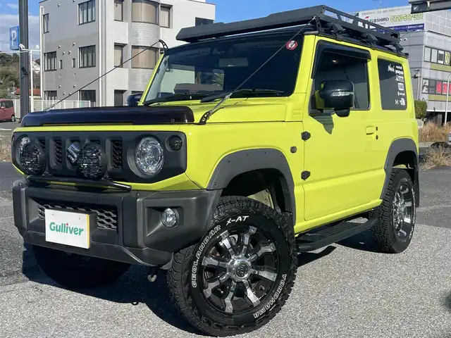 スズキ ジムニー XC 千葉県 2018(平30)年 6万km キネティックイエロー/ブラック スズキセーフティサポート/〇ブレーキサポート/〇誤発信抑制機能/〇車線逸脱防止機能/クルーズコントロール/社外8インチナビ（ケンウッド）/・AM/FM/BTオーディオ/フルセグTV/YOKOHAMA　GEOLANDAR X-AT16インチタイヤ/社外マフラー/IPFオフロードランプ/ルーフキャリア/リアラダー/アルミペダル/ヒルホールドコントロール/ヒルディセントコントロール/ヒーテッドミラー/ヘッドランプウォッシャー/オートライト/ETC/LEDヘッドライト/社外16インチAW/保証書/取扱説明書