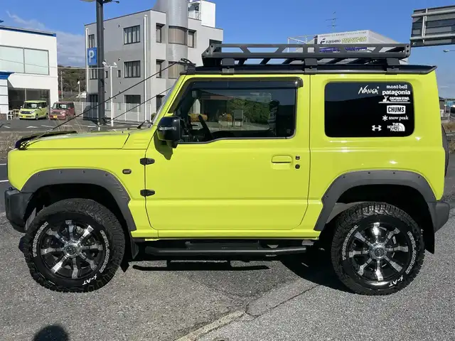 スズキ ジムニー XC 千葉県 2018(平30)年 6万km キネティックイエロー/ブラック スズキセーフティサポート/〇ブレーキサポート/〇誤発信抑制機能/〇車線逸脱防止機能/クルーズコントロール/社外8インチナビ（ケンウッド）/・AM/FM/BTオーディオ/フルセグTV/YOKOHAMA　GEOLANDAR X-AT16インチタイヤ/社外マフラー/IPFオフロードランプ/ルーフキャリア/リアラダー/アルミペダル/ヒルホールドコントロール/ヒルディセントコントロール/ヒーテッドミラー/ヘッドランプウォッシャー/オートライト/ETC/LEDヘッドライト/社外16インチAW/保証書/取扱説明書