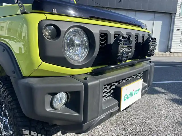 スズキ ジムニー XC 千葉県 2018(平30)年 6万km キネティックイエロー/ブラック スズキセーフティサポート/〇ブレーキサポート/〇誤発信抑制機能/〇車線逸脱防止機能/クルーズコントロール/社外8インチナビ（ケンウッド）/・AM/FM/BTオーディオ/フルセグTV/YOKOHAMA　GEOLANDAR X-AT16インチタイヤ/社外マフラー/IPFオフロードランプ/ルーフキャリア/リアラダー/アルミペダル/ヒルホールドコントロール/ヒルディセントコントロール/ヒーテッドミラー/ヘッドランプウォッシャー/オートライト/ETC/LEDヘッドライト/社外16インチAW/保証書/取扱説明書