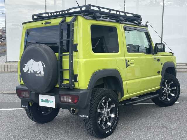 スズキ ジムニー XC 千葉県 2018(平30)年 6万km キネティックイエロー/ブラック スズキセーフティサポート/〇ブレーキサポート/〇誤発信抑制機能/〇車線逸脱防止機能/クルーズコントロール/社外8インチナビ（ケンウッド）/・AM/FM/BTオーディオ/フルセグTV/YOKOHAMA　GEOLANDAR X-AT16インチタイヤ/社外マフラー/IPFオフロードランプ/ルーフキャリア/リアラダー/アルミペダル/ヒルホールドコントロール/ヒルディセントコントロール/ヒーテッドミラー/ヘッドランプウォッシャー/オートライト/ETC/LEDヘッドライト/社外16インチAW/保証書/取扱説明書