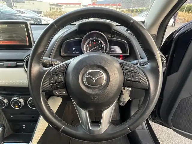 マツダ デミオ XD ツーリング Lパッケージ 岡山県 2014(平26)年 6.8万km ジェットブラックマイカ 登録時走行距離67249km/純正ナビ/フルセグTV(AM/FM/CD/DVD/Bluetooth)/ETC/ヘッドアップディスプレイ/クルーズコントロール/衝突軽減ブレーキ/LEDヘッドライト/パドルシフト/アイドリングストップ/ハーフレザーシート/横滑り防止/オートライト/スマートキー/純正フロアマット/16インチ純正AW/社外レーダー探知機