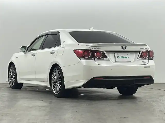 トヨタ クラウン ハイブリッド アスリートG Four 福島県 2015(平27)年 10.6万km ホワイトパールクリスタルシャイン トヨタセーフティーセンス　/・PCS/・車線逸脱警報/・オートマチックハイビーム/・レーダークルーズコントロール/純正HDDナビゲーション/【AM/FM/DVD/CD/Bluetooth/フルセグ】/バックカメラ　/レザーシート　/・パワーシート　/・シートヒーター　/オービスレーダー　/クリアランスソナー　/革巻きステアリング　/・ステアリングスイッチ　/プッシュスタート　/・スマートキー/LEDライト/・オートライト/電動格納ミラー