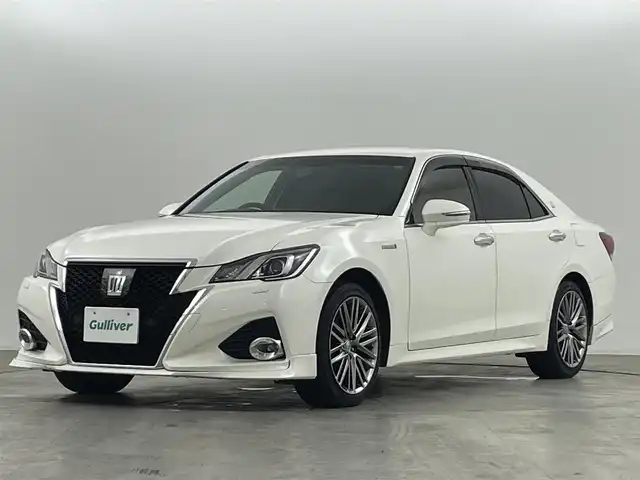 トヨタ クラウン ハイブリッド アスリートG Four 福島県 2015(平27)年 10.6万km ホワイトパールクリスタルシャイン トヨタセーフティーセンス　/・PCS/・車線逸脱警報/・オートマチックハイビーム/・レーダークルーズコントロール/純正HDDナビゲーション/【AM/FM/DVD/CD/Bluetooth/フルセグ】/バックカメラ　/レザーシート　/・パワーシート　/・シートヒーター　/オービスレーダー　/クリアランスソナー　/革巻きステアリング　/・ステアリングスイッチ　/プッシュスタート　/・スマートキー/LEDライト/・オートライト/電動格納ミラー