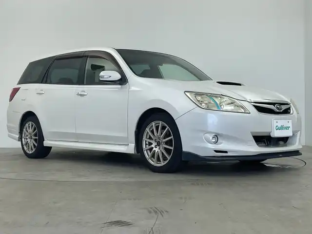 スバル エクシーガ 2．0GT tuned bySTI 鹿児島県 2010(平22)年 6.7万km サテンホワイトパール 300台限定車/純正HDDナビゲーション/専用ハーフレザーシート/MOMOステアリング/クルーズコントロール/パドルシフト/D/N席パワーシート/バックカメラ/ETC/純正フロアマット/純正17インチアルミホイール/キセノンライト/スタッドレス積込