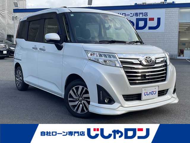 トヨタ ルーミー カスタムG S 福井県 2018(平30)年 9.4万km パールホワイトⅢ (株)IDOMが運営する【じしゃロン福井店】の自社ローン対象車両になります。こちらは現金またはオートローンご利用時の価格です。自社ローンご希望の方は別途その旨お申付け下さい/純正ナビ（CD・DVD・BT接続可）/フルセグテレビ/バックカメラ/ETC/両側パワースライドドア/LEDヘッドライト/純正フロアマット